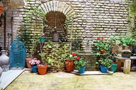 Unique Experience In Seville Sevilla Spain Old Fashioned Rustic Antique Austere Courtyard Patio In Stone Brick House Fu Patio Planter Vessel Concrete Patio