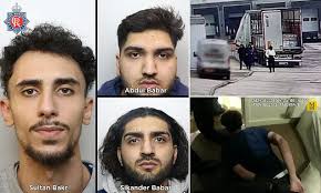 Moment murderers are caught trying to flee Britain in the back of a lorry  days after knifing a man to death at set of traffic lights: Trio jailed for  life