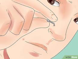 Place the end of the ring over the piercing in your nose. 4 Ways To Take Your Nose Stud In And Out Of Your Nose Wikihow Life