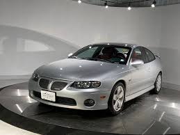 Image result for Dark Otter Gray 2004 Pontiac