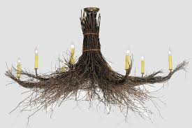 For a rustic table décor, you can use small twigs to make a frame for the table numbers. Lighting Twigs Shine In Home Decor Wsj