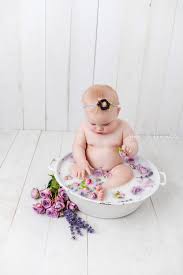 Milk bath photography for baby looks beautiful and is good for their skin too! Milk Bath Blog Newborn Baby Maternity Photographer In Spokane Washington