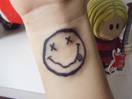 2,977,900 likes · 2,033 talking about this. Kurt Cobain Nirvana Smile And Tattoo Image 688892 On Favim Com