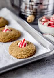 Roll ball in the additional sugar and place on an ungreased cookie sheet. Candy Cane Hershey Kiss Cookies The Best Holiday Cookies Jz Eats
