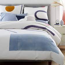 Grab this stunning duvet set from west elm for a luxe look without breaking the bank. Hand Blocked Shapes Duvet Cover Shams