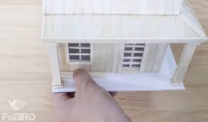 Here's one way that uses cheap and eas… How To Make A Popsicle Stick House With Free Template