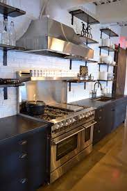 As a designer, you'll need to choose kitchen cabinets that are functional, robust and aesthetically pleasing. Modern Industrial Kitchen With Blue Cabinets And Stainless Range And Hood Industrial Kitchen New York By Columbia Cabinets Houzz