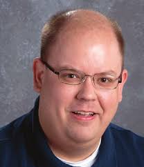 Firefighters rescue men trapped in grain bin