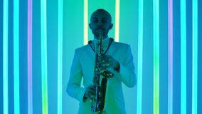Github is where over 56 million developers shape the future of software, together. A Cool Saxophonist In A White Suit Performs A Solo In The Studio Against The Backdrop Of Bright Multicolored Neon Pipes Stock Video Video Of Concert Bright 205742207