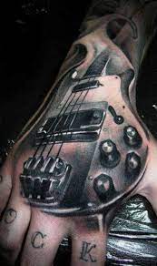 Guitar Tattoo By Piotr Deadi Dedel Post 3849 Hand Tattoos Guitar Tattoo Design Music Tattoos