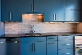 This Wet Bar Features Flat Panel Wood Cabinets Sw Gray Harbor Square Cabinet Hardware Abs Kitchen Interior Black Granite Countertops Under Cabinet Lighting