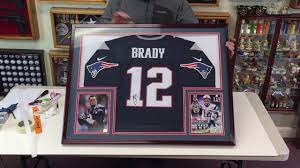 Obviously, take careful measurements of the shirt so that it will fit neatly into the shadow box, but more importantly, take measurements as to where you will place or hang the box. How To Professionally Frame A Football Jersey In A Sports Display Case Youtube