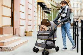 start walking on sunshine with the new and improved cloud 9 pet stroller it boasts of trendy colorways mustard yello pet stroller diy dog stuff pet safety