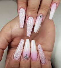 The most common artificial nails on the market today are acrylic nails. Acrylic Pink Coffin Nails With Diamonds Nail And Manicure Trends
