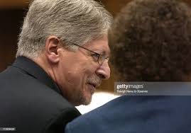 Former Durham district attorney Mike Nifong speaks with attorney Ann...  News Photo