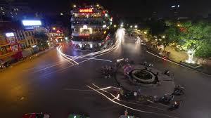 Timelapse of city square with traffic at night Hanoi, Vietnam