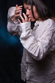 For white women, these hairstyles are a personal choice rooted in vanity that can be easily removed or washed away, just like a beachy wave or a high ponytail. Young Woman With Black Hair Who Is Feels Bad Wearing A Long White Shirt Trying To Cover Her Face With Her Hands Indivstock