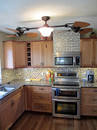 Clean off remaining debris and dust from the wall and counter. A Kitchen Remodel 7 Tile Backsplash And Faux Textured Tin Surface Designandtechtheatre