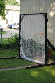 Softball Baseball Net For Hitting And Learning To Pitch Reynaldo Thought This Up Www Bathouseboutique Backyard Baseball Baseball Pitching Batting Cages