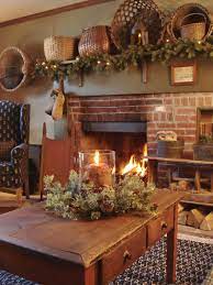 Prim Christmas Old Table With Candle Pine Fireplace Shelf With Old Prim Baskets L Primitive Decorating Country Primitive Decorating Country House Decor