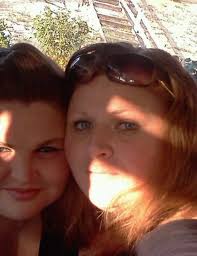 My sister passed away last year and I would love this photo to have a  better background possibly a garden. Thank you.