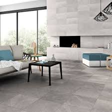 The assortment of floor tiles comes in various textures, and dimensions to match the interior of your house. Vinaros Smoke Grey Textured Decor Wall Tile Tileflair
