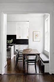 Natural woods make the highest quality kitchen cabinets by far. Black Bentwood Chairs At Brown Oak Dining Table Transitional Dining Room