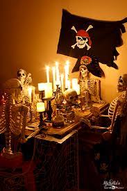 All you need to do is take the tassels off the string, removing the flags from the dowels, slide tassels and flags in an alternating. How To Host A Pirate Dinner Party Halloween Party Ideas Michelle S Party Plan It