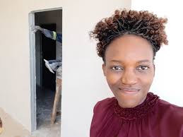 Susan Mwenda-Mulongoti added a...