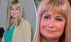 Siân Lloyd can't collect her mail without wobbling amid stalker drama