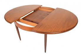 Round counter height tables work perfectly in a few different settings. Round Dining Table With Butterfly Leaf Ideas On Foter
