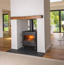 Sleek marble paired with stunning dark emerald walls looks sophisticated without being stuffy. Df Croft Double Sided Resize Small Wood Stove Double Sided Stove Wood Burning Stoves Living Room