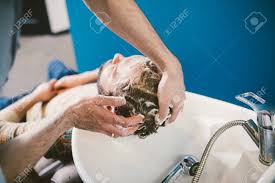 barbershop theme. barber is washing the