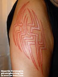 Body modification (or body alteration) is the deliberate altering of the human anatomy. Scar And Tattoo Combos Bme Tattoo Piercing And Body Modification News
