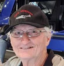 Historical photo of John Doube at Auckland Airport in the 1960s