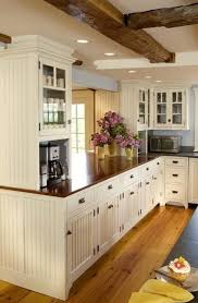 Beadboard kitchen cabinets add beadboard to stock cabinets. Kitchen Opening To Living Area Country Cottage Kitchen Kitchen Cabinet Design Kitchen Design