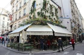 The Traditional French Cafe Maison Sauvage Decorated For Christmas French Cafe Christmas Decorations Cafe