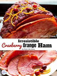 This Cranberry Orange Baked Ham Is Seasoned Perfectly With Cinnamon Cloves Fresh Cranberries Orange Honey A Cranberry Recipes Baked Ham Ham Recipes Crockpot