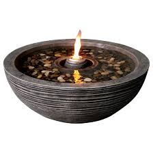The pool of water surrounding the fire reflects the warm glow of the fire and gives a soft romantic feel. Style Selections Fire Pit Fountain 24 In Stone Natural Y95781 Reno Depot