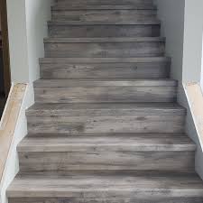 Luxury vinyl stair treads function as a cohesive top layer for each stair, eliminating the need for stair nosing. Custom Vinyl Plank Stair Nosing Free Estimate