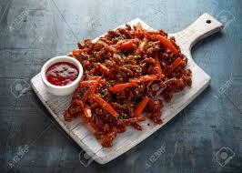 Touch device users, explore by touch or with swipe gestures. Crispy Shredded Beef With Carrots And Sweet Chilli Sauce On White Wooden Board Chinese Takeaway Food Stock Photo Picture And Royalty Free Image Image 119118873