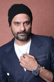 Portrait of a Young Man in a Patterned Shirt · Free Stock Photo