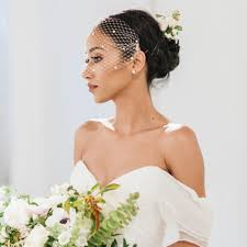 Side chignon with birdcage veil. 20 Best Birdcage Veils Of 2021