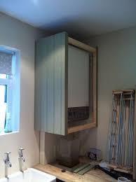 Comment Cacher Une Chaudiere Murale In 2020 With Images Boiler Cover Ideas Boot Room Framed Bathroom Mirror