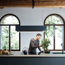 Island extractor hoods are too large for low ceilings and may not leave a safe distance between itself and the hob. Island Range Hood Levante Falmec Ceiling Mounted With Built In Lighting Original Design