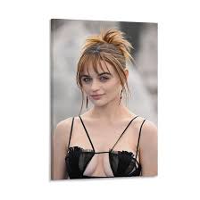 She displays her shapely legs in arousing black hosiery