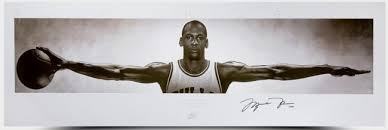 A photo with 2 detailed photos are framed in a beveled mat with a black frame. Michael Jordan Signed Wings Poster Unframed The Autograph Source