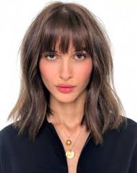 Mane Addicts Clever Instagram Captions For All Your Brunette Hair Posts Mane Addicts Short Hair With Bangs Curly Hair Styles Naturally Short Brunette Hair