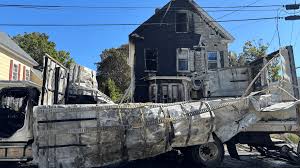 Box truck fire spreads to home in Sanford