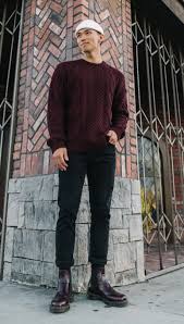 Women's olive parka, beige knit oversized sweater, burgundy skinny jeans, brown suede chelsea boots. How To Wear Chelsea Boots 10 Outfit Ideas Dr Martens